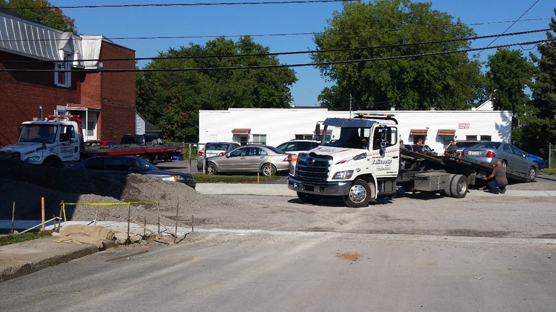 Stationnement au centre-ville: des propriétaires prennent les grands moyens