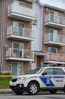 C'est dans l'appartement au rez-de-chaussée qu'a eu lieu le meurtre d'une dame de 26 ans.  Trois-Rivières le 1er octobre 2011. NICOLAS DUCHARME/L'ÉCHO DE TROIS-RIVIÈRES/AGENCE QMI