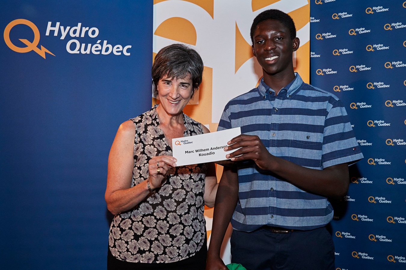 Marc Wilhelm Anderson Kouadio accompagné de madame Carolyne Hudson,conseillère dons et commandites.