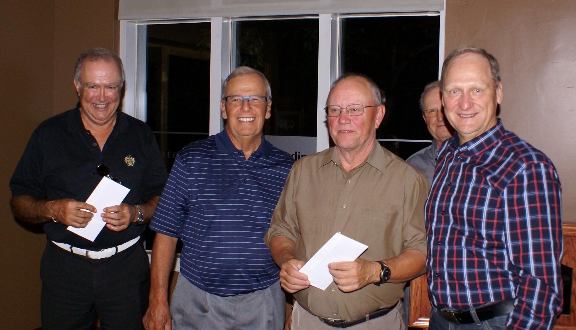 Le quatuor gagnant du tournoi de clôture, composé de Michel Lacombe, Laurent Cordeau, Pierre Morin et Jean Guimond. En arrière-plan, le capitaine du club, Jacques Falardeau.