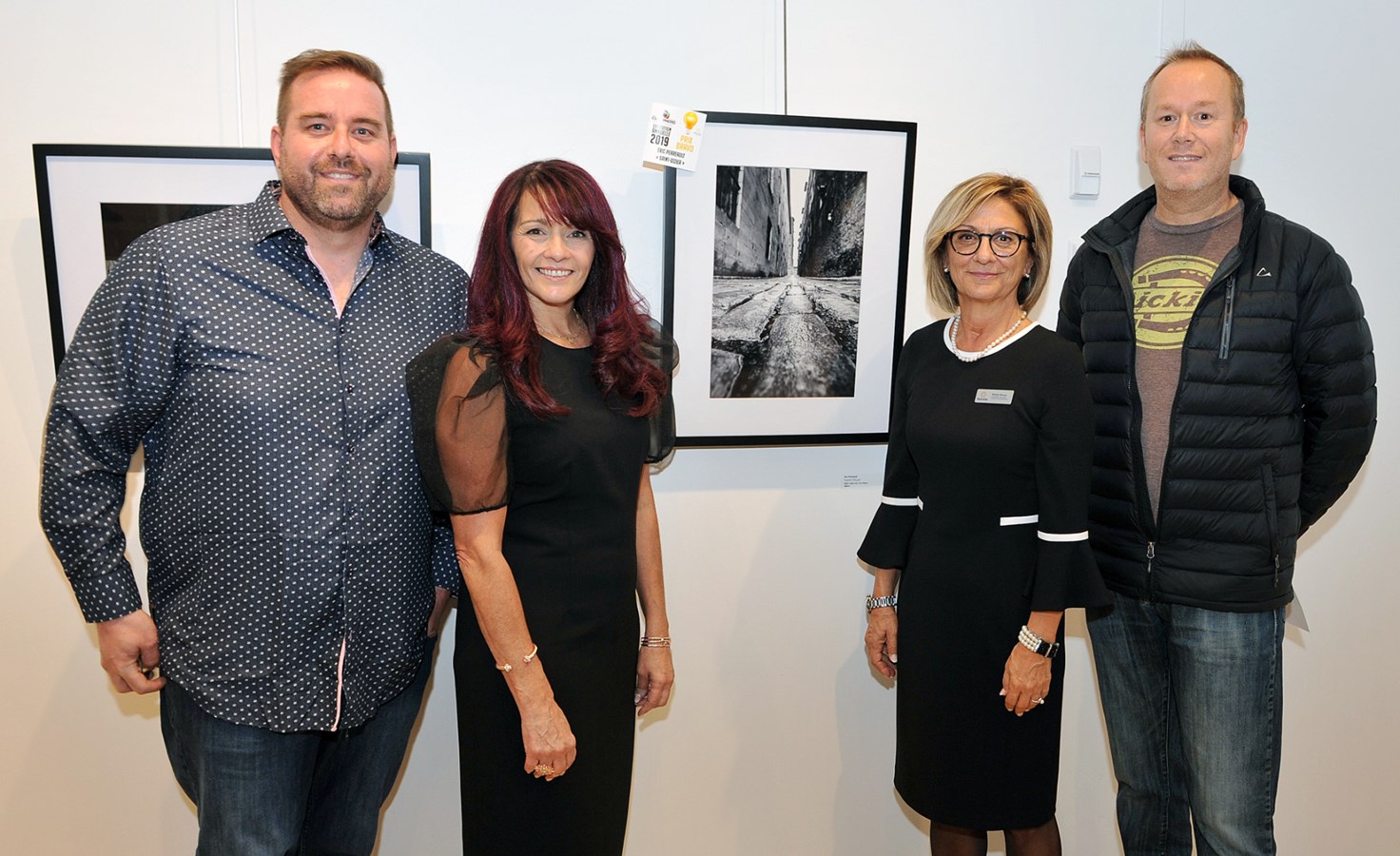 Marc Archambault, président du Club Photo Blainville; Marie-Claude Collin, présidente de la commission de la culture; Michèle Murray, vice-présidente de la commission de la culture et Eric Perreault, récipiendaire du prix B.R.A.V.O. avec sa photographie "Saint-Dizier".
