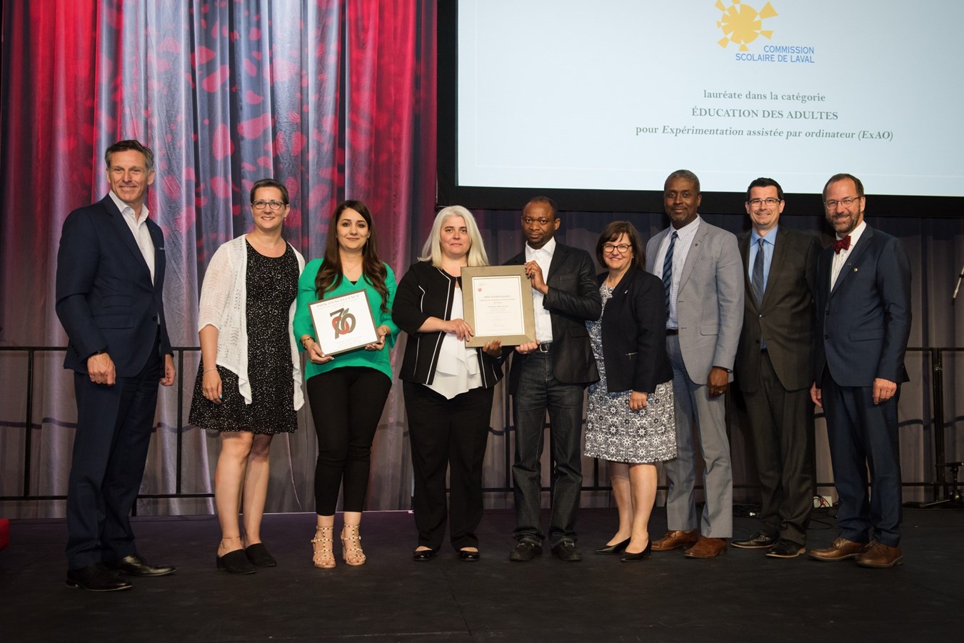 Paul Raymond, président du Concours des Prix d’excellence, Isabelle Beaudin,
coordonnatrice du Service de l’éducation des adultes, de la formation professionnelle et du Service
aux entreprises, Asma Belhiba, conseillère pédagogique à la CSDL, Carmen Ciocoiu,
enseignante de sciences et Hubert Maizan Kouassi, technicien en laboratoire au Centre de
formation les Berges, Louise Lortie, présidente de la CSDL, Yves Michel Volcy, directeur général
de la CSDL, Jean-Pierre Archambault, directeur général adjoint à la CSDL, et Alain Fortier,
président de la FCSQ.