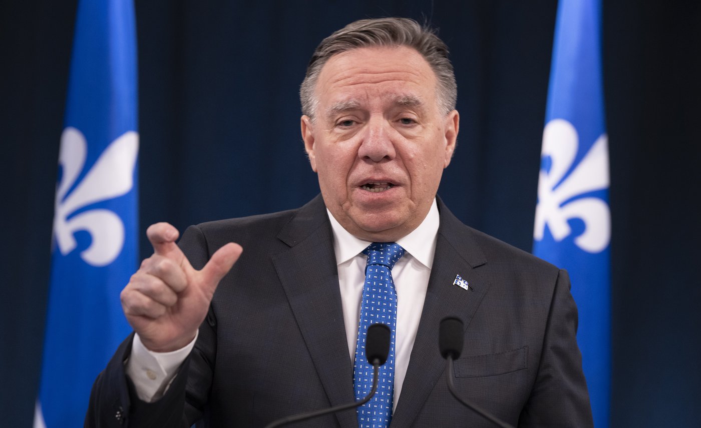 Ottawa doit relocaliser de force les demandeurs d'asile, estime Legault