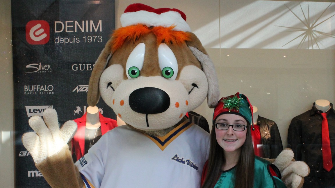 La mascotte "Lèche-Vitrine" et un lutin du Père Noël