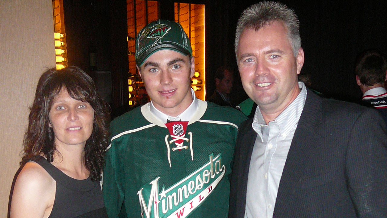 Dylan avec ses parents.