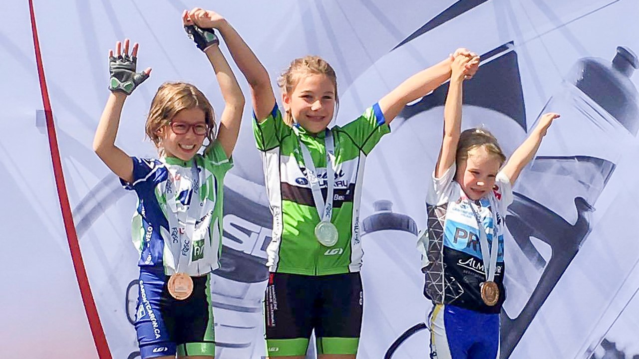Marguerite Blais au centre sur le podium