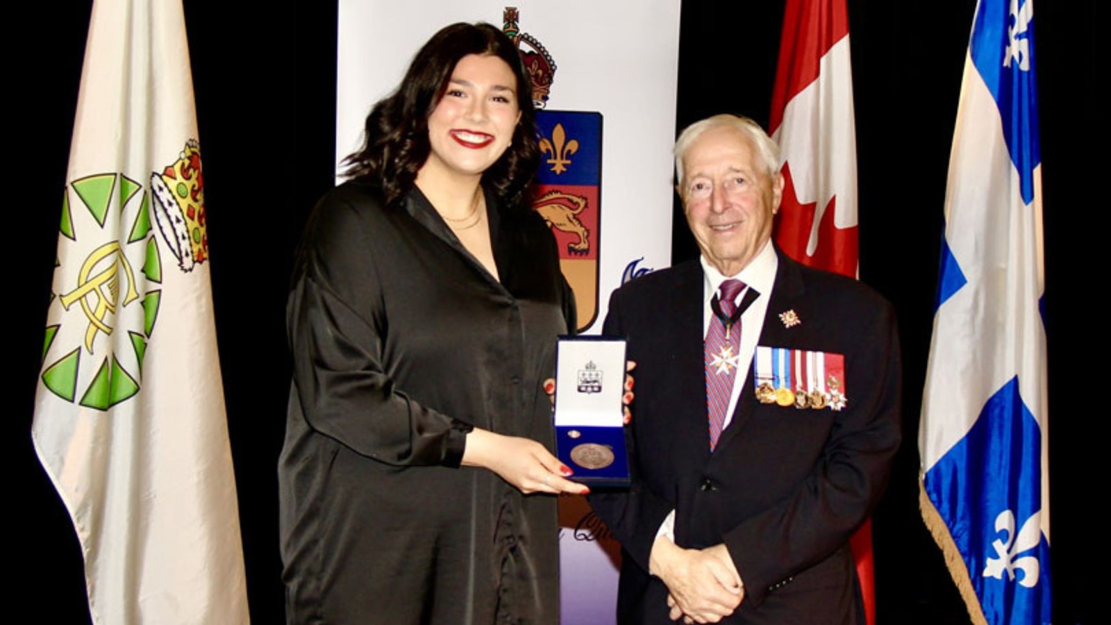 Audrey Fortin en compagnie du Lieutenant-gouverneur du Québec, J. Michel Doyon.