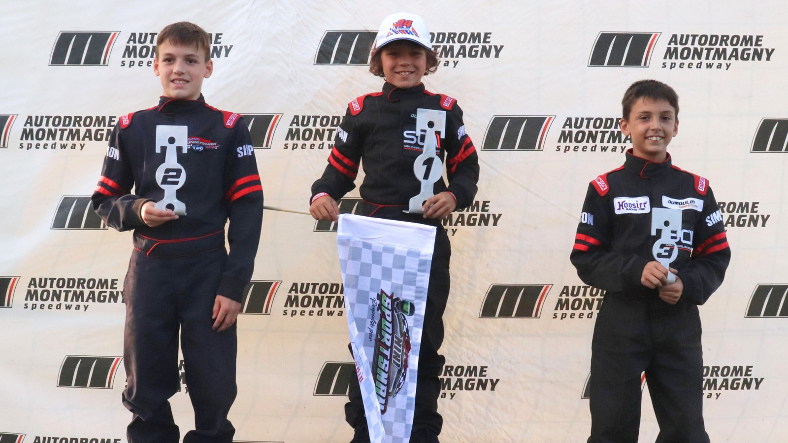Le podium de la course développement avec Alexis Cliche au centre